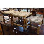 Three mixed wood framed footstools, all with woven panels and turned supports