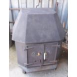 A modern cast iron wood burner with English Rose decoration - widest 26½" X highest 32½"