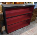A 3' 4" painted wood three shelf open bookcase