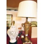 An Oriental style pierced white porcelain table lamp - sold with an antiqued vase pattern similar