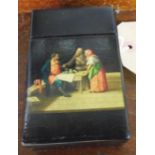 A Russian lacquer playing card case with decoration to front and gilt Russian coat of arms and
