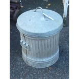 A small galvanized dustbin