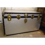 A 36" 20th Century textured aluminium clad travelling trunk with studded binding and metal corners