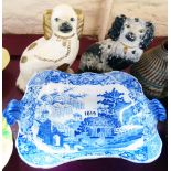 Two mismatched Staffordshire spaniels - sold with a blue and white footed tureen