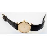 A gold tone cased lady's Longines wristwatch on original black leathers strap - no box, no papers