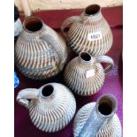 Five German Dee Cee pottery jugs of swirl design