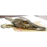 A silver plated duck pattern paperclip with glass eyes