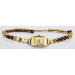 A vintage 9ct. gold cased lady's Avia wristwatch with 9ct. brick-link bracelet