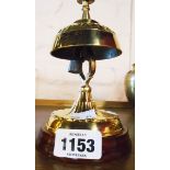 A brass reception bell