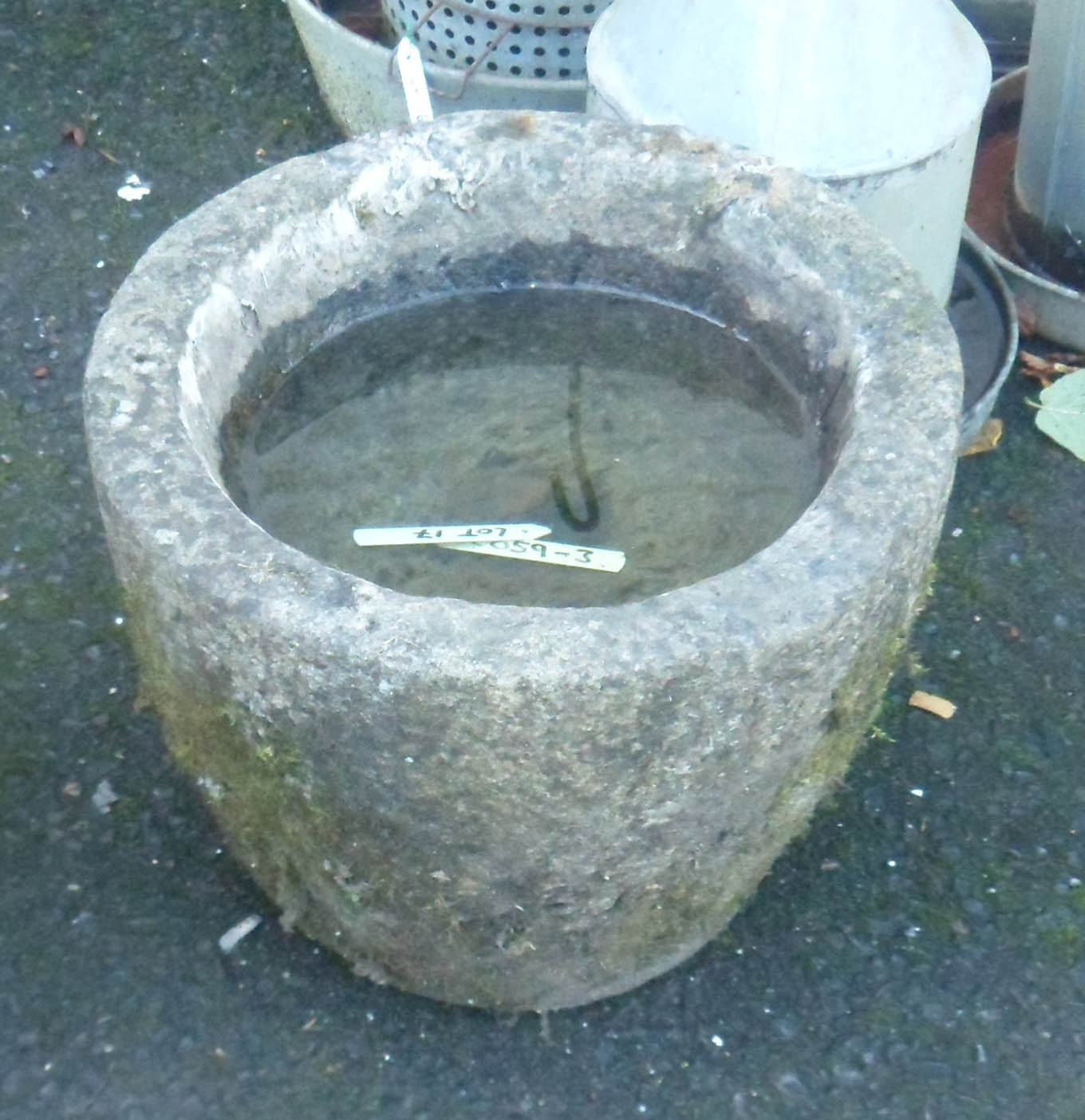 A 15½" diameter carved granite mortar