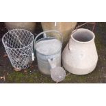 A vintage watering can, wire basket and conical pail