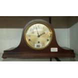 A polished oak cased Napoleon hat mantel clock with eight day Westminster and Whittington chiming