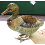 A 2¼" late 19th Century painted white metal pen wipe in the form of a duck, in the Vienna style