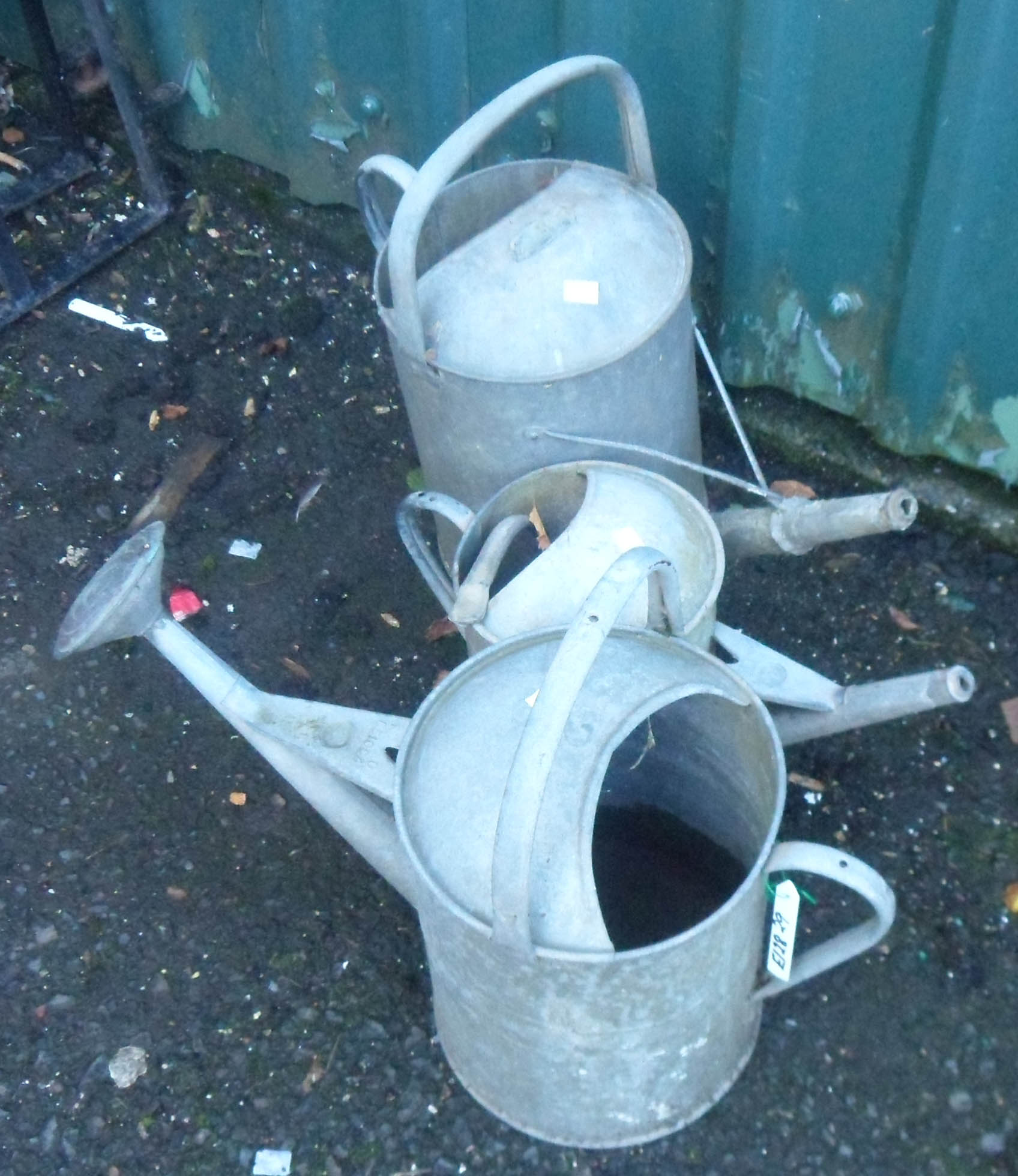 Three galvanised watering cans - one a/f