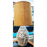 A large vintage Tremaen pottery table lamp with impressed abstract design on white ground - with