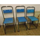 A pair of vintage metal framed stacking chairs and another similar, all with remains of painted