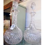 A pair of cut glass Sherry decanters