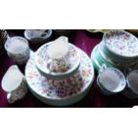Approximately forty pieces of Mintons Haddon Hall pattern china including dinner plates, tea plates,
