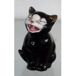 A 2½" high Royal Doulton lucky cat figurine, also referred to as Ooloo from Bonzo the dog