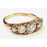 An 18ct. gold graduated five stone diamond ring - approx. 2.5ct TDW