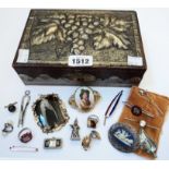 A wooden box containing a small quantity of jewellery including marked 9ct. bar brooch, enamelled