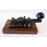 A Second World War period W.T. 8 amp Group 14 Morse tapper No. 2 Mk. III, set on later wooden base