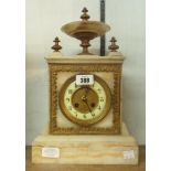 A late Victorian marble cased and gilt metal mounted mantle clock with fountain pattern finials