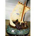 A 13" ceramic d'art terracotta model of a fishing boat "au large" with stamp to rear