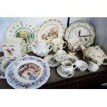 A box containing Royal Doulton nursery ware including teapot, mugs, plates, etc. - sold with a