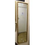 A mid 20th Century gilt framed slender oblong wall mirror