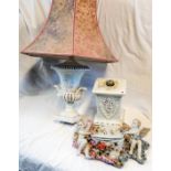 An Italian two part pottery table lamp in the form of a Classical urn set on a plinth, with