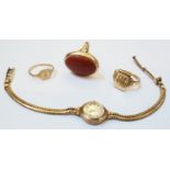 Three 9ct. gold rings - sold with a 9ct. gold cased lady's Rotary wristwatch