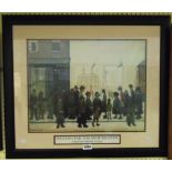 †L. S. Lowry: a framed coloured print, entitled "Waiting for the Shop to Open"