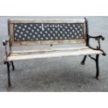 A 4' 1" reproduction cast iron and teak slatted garden bench