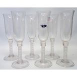 A set of six large champagne flutes with air twist stems