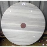 A 26" diameter grey marble table top with pink granite centre