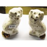 A pair of 7" Staffordshire spaniels