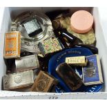 A box containing a papier-mâché snuff box, mini Guinness bottles, vestas, matchbox holders, etc.