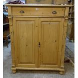 A 3' 7 1/2" waxed pine cabinet with single drawer, retractable doors and removable interior -