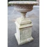 A 30 " diameter concrete clad fibreglass classical pedestal bowl with basket weave border, set on