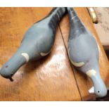 Two hand painted wood pigeon decoys