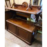 A 4' Victorian mahogany buffet servery with shield and scroll motif to raised back, rounded