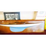 A 4' overall half hull model of a yacht - sold with a framed modern black and white photograph of
