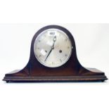 A polished oak cased Nelson's hat mantel clock with eight day gong striking movement