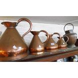 A set of four graduated copper haystack measures, two gallons to quart - sold with a copper jug
