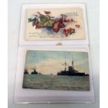 A small album containing First World War postcards including posed military subjects, fleet of