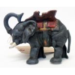 A reproduction elephant pattern novelty money box