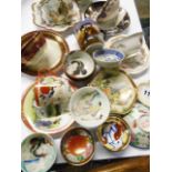 A collection of Oriental ceramics including tea bowls, cabinet cups and saucers, etc.