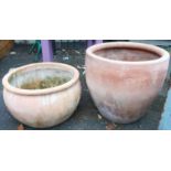 A 20 1/2" diameter terracotta planter - sold with a 20" diameter bowl shaped similar