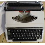 A Silver Reed portable typewriter